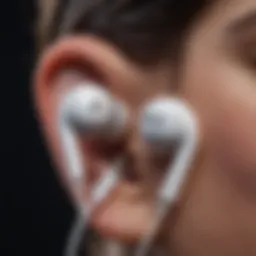 Sleek design of Apple style earbuds