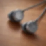 Close-up view of Bose in-ear noise cancelling earbuds showcasing their sleek design and premium materials.