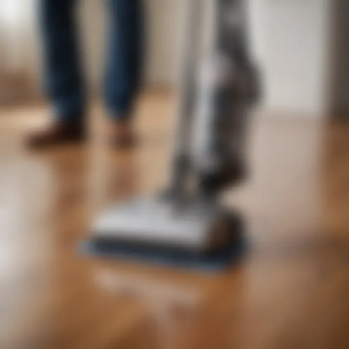 A user demonstrating effective vacuum techniques on hard floors