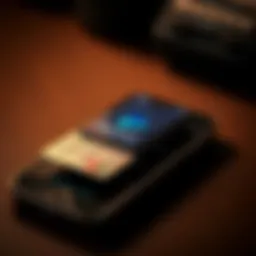 Close-up view of PayPal credit card reader attached to a smartphone